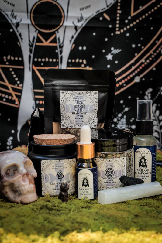 Hecate Ritual Set featuring soy candle, bath salts, ritual oil, and cleansing spray for shadow work and moon magic.