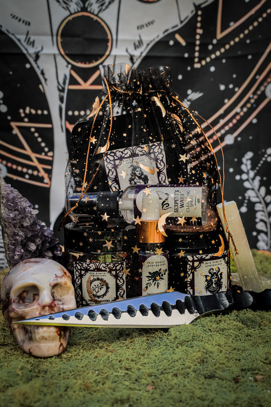 Lilith Ritual Kit with soy candle, bath tea, ritual oil, and cleansing spray for divine feminine empowerment and shadow work.