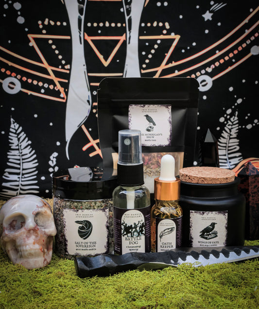 The Morrigan Ritual Kit comprising soy candle, bath tea, ritual oil, and cleansing spray for sovereignty and transformation rituals