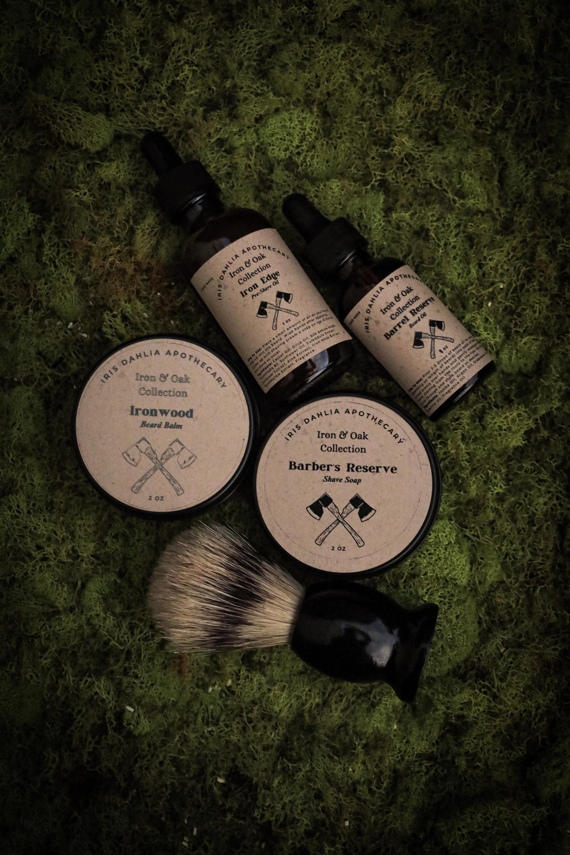 a group mens beard care products and shave brush sitting on top of a lush green field